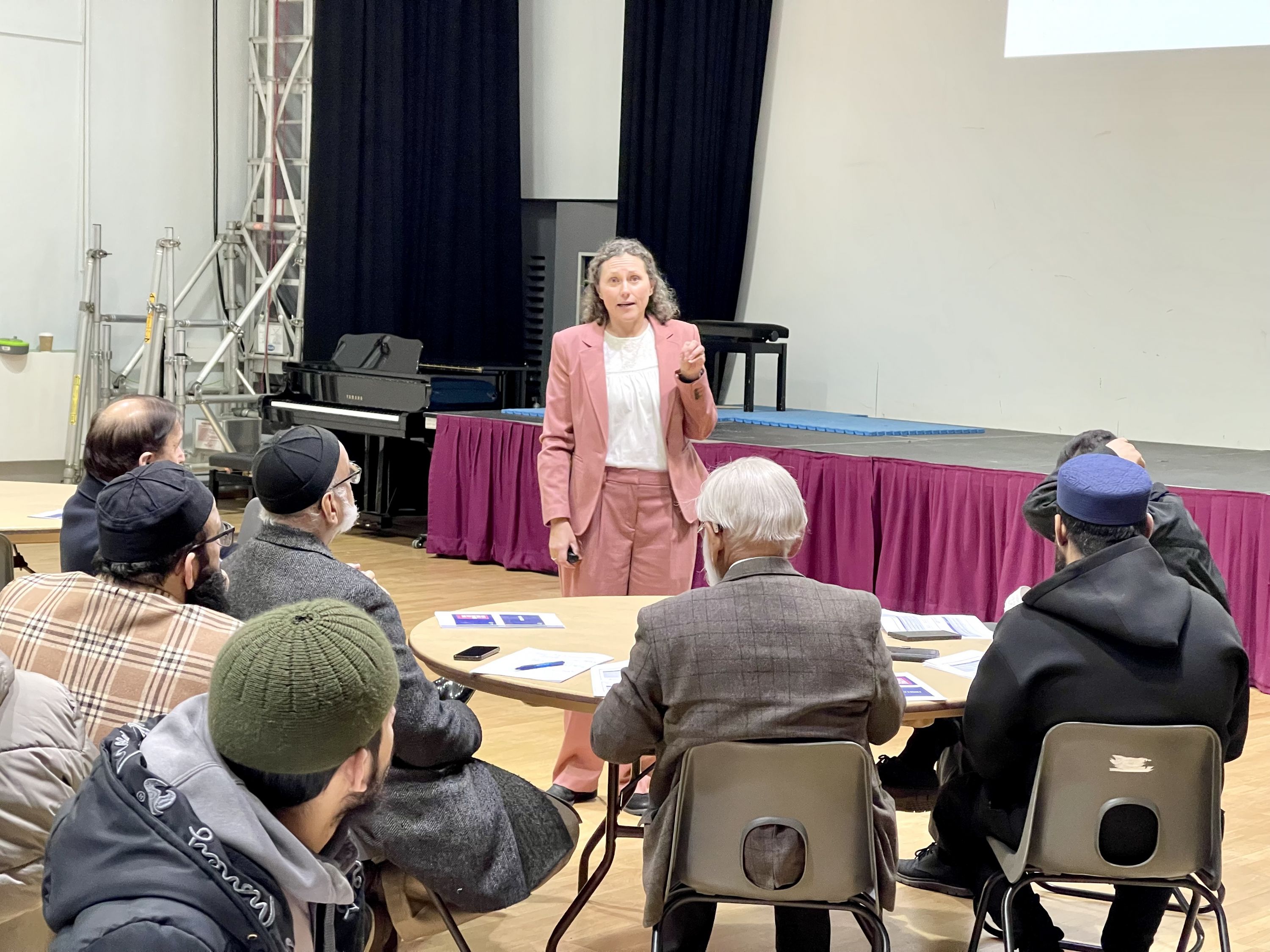 Jude Macdonald leading the training session to attendees.